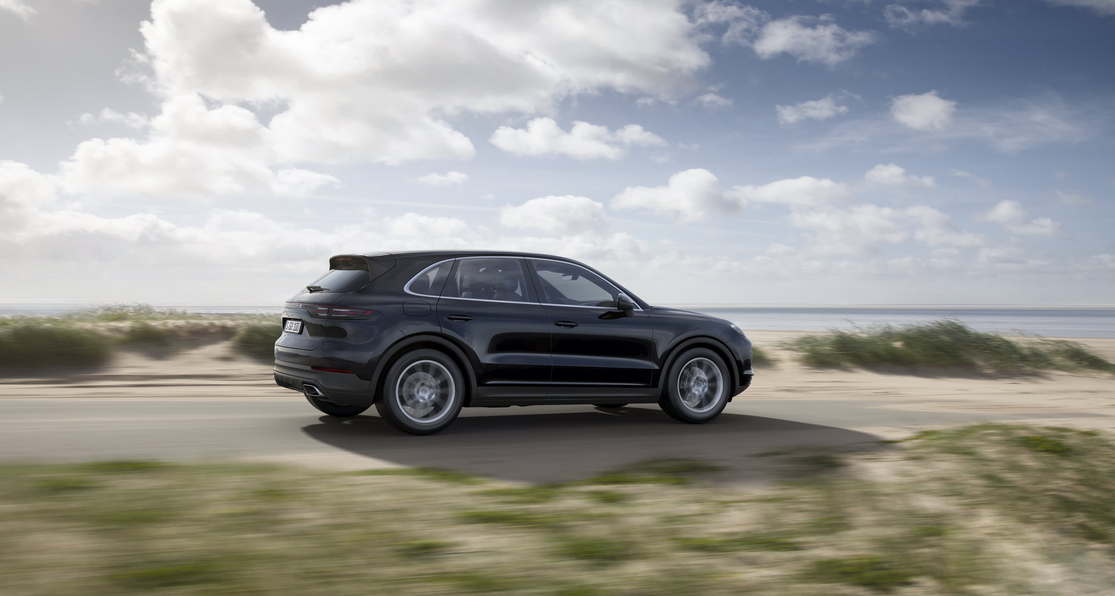 Porsche Cayenne fahrend