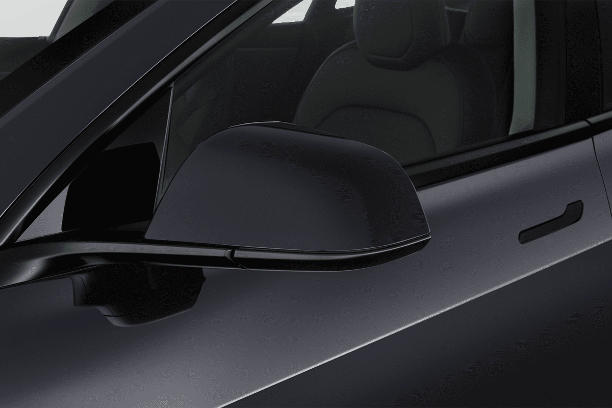 Rückspiegel eines Tesla Model 3 (KI-generiert)