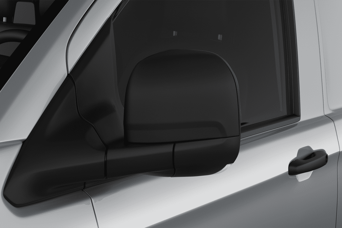 Rückspiegel eines VW Transporter Kastenwagen 