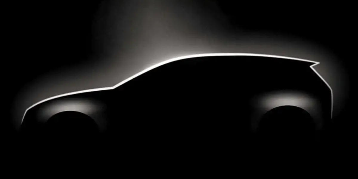 Dunkles Bild, darauf ein der Umriss reines Autos zu sehen - womöglich der neue VW Golf 9