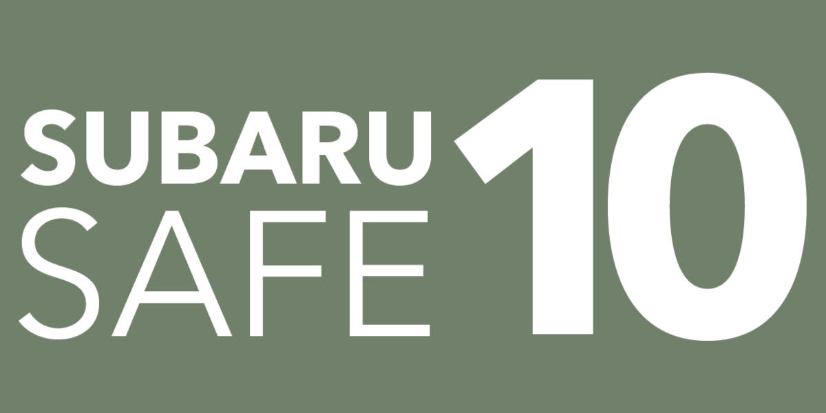 Die Grafik zeigt einen matten, olivgrünen Hintergrund mit weißer Aufschrift. Links steht zweizeilig das Wort „SUBARU SAFE“, rechts daneben ist eine große Zahl „10“ abgebildet.